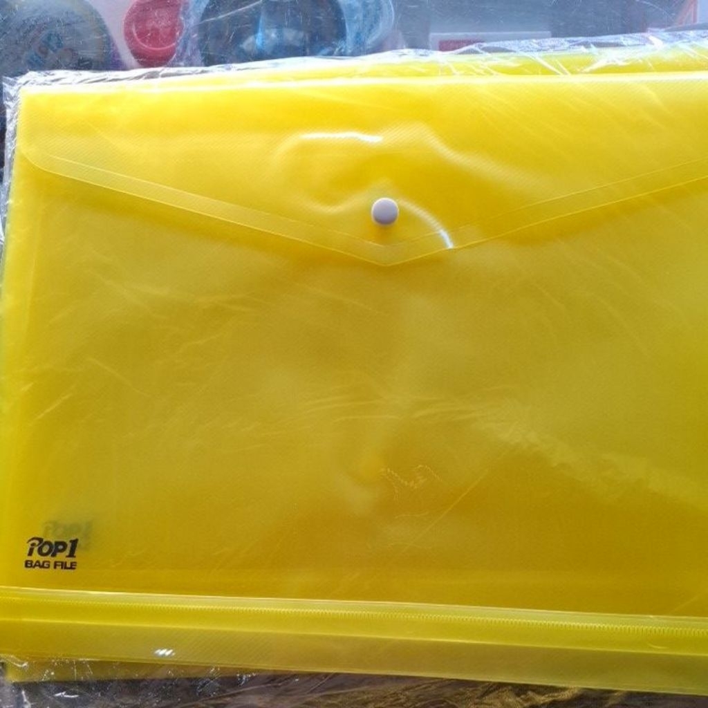 

(1pak) map plastik kancing 1 pop 1 (1pak=12 lembar)