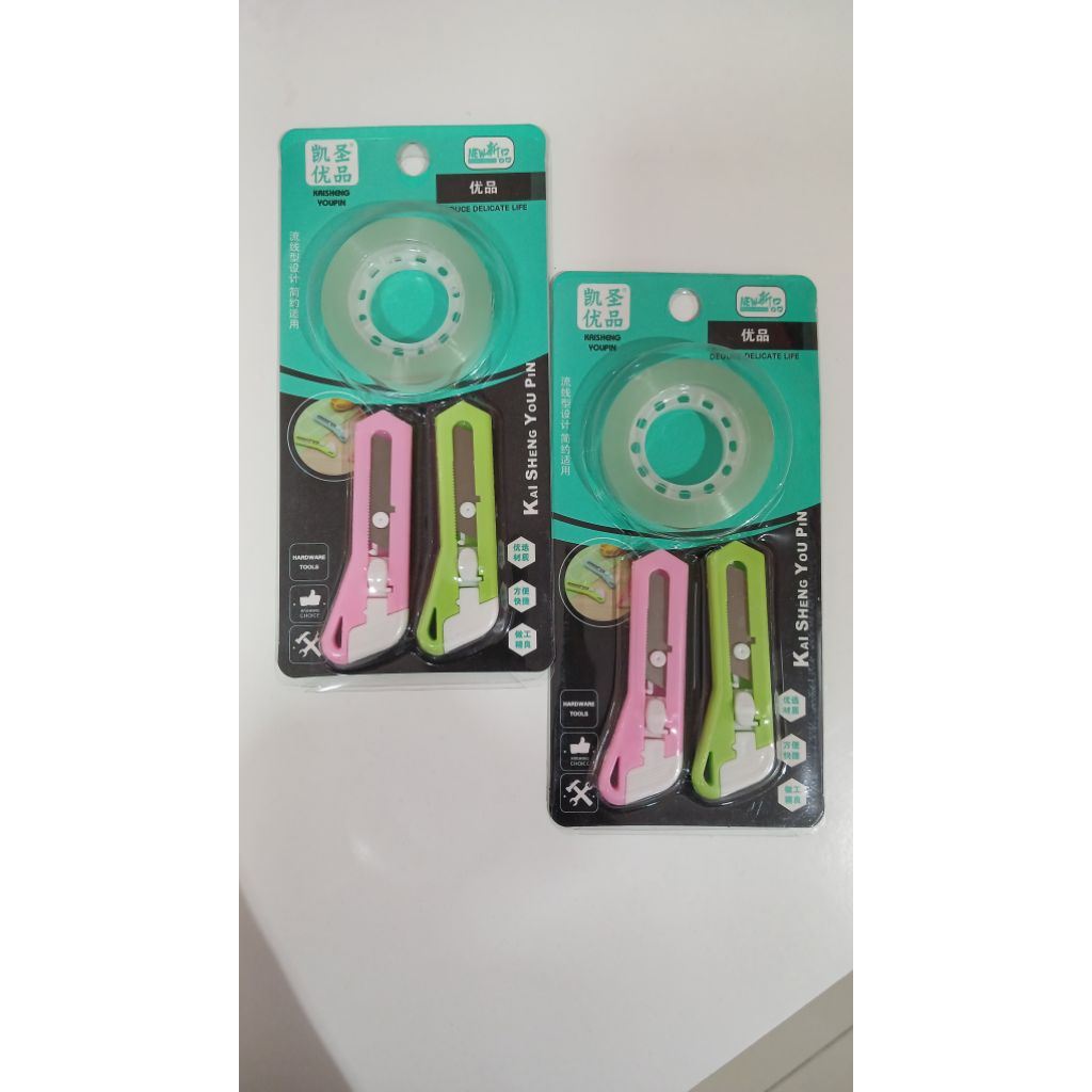 

Cutter isi 2 dan lakban kecil