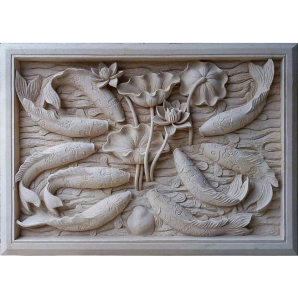 ukiran batu alam motif ikan koi
