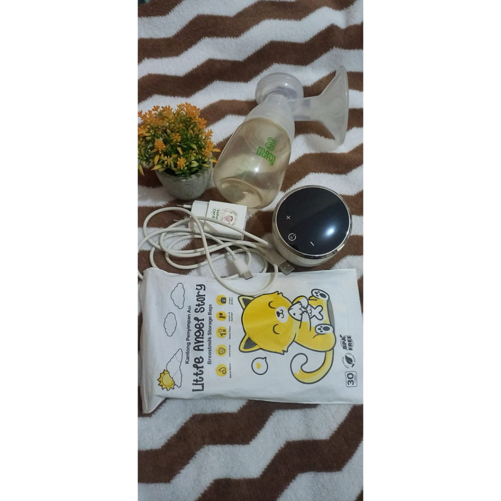 preloved pompa asi mom uung