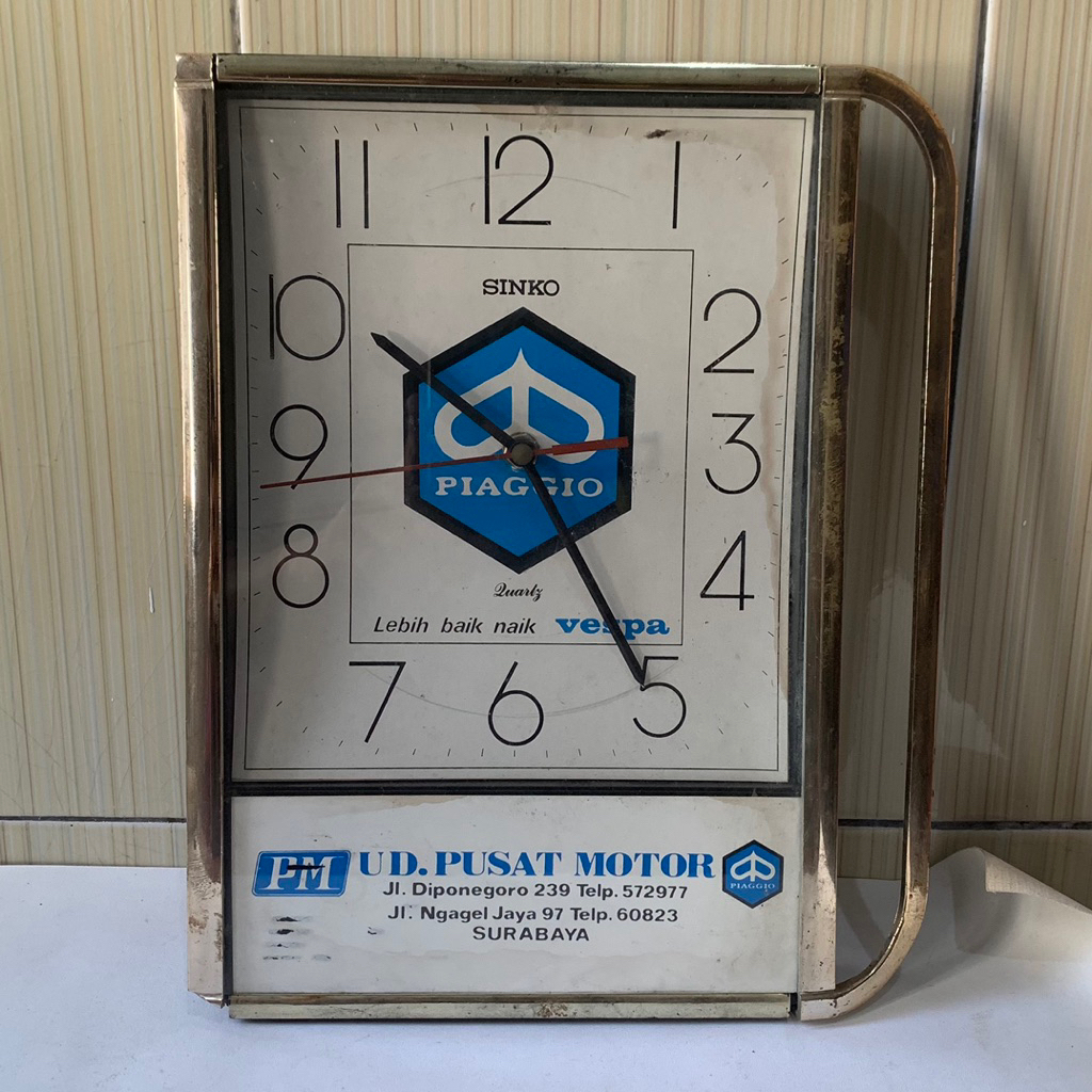 jam dinding dealer vespa
