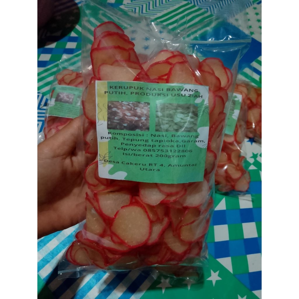 

Kerupuk Nasi bawang putih (kerupuk mentah) olahan asli amuntai, Berat 200gram