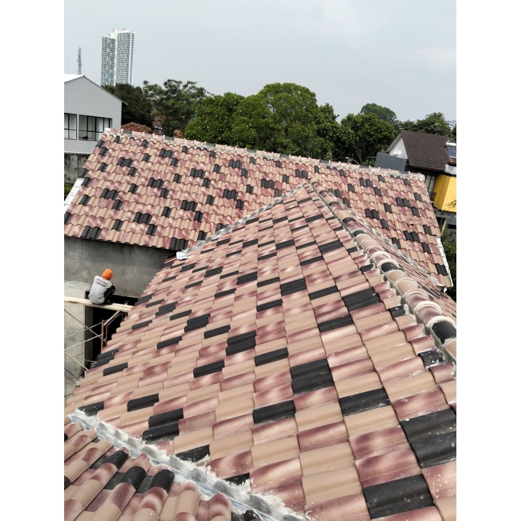 renovasi atap lama  ganti baja ringan dan genteng plat beton