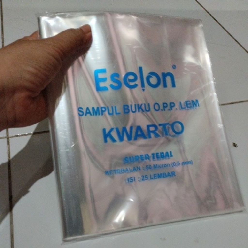 

sampul buku O.P.P Lem,Eselon plastik ukuran buku kwarto 1pack isi 25 lembar