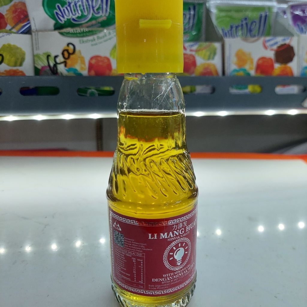 

Minyak wijen/ limang huat minyak wijen 300ml