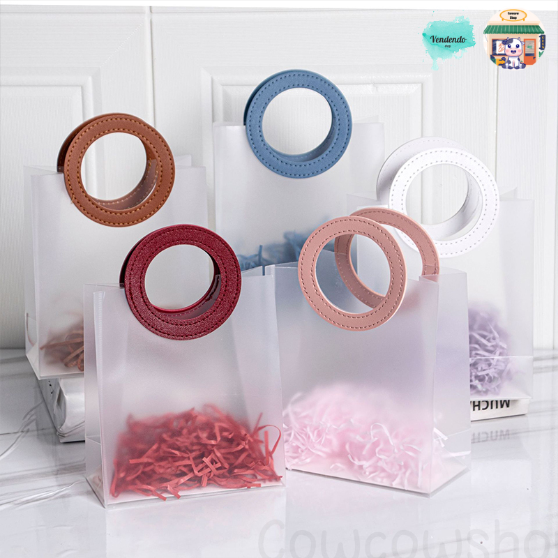 

Goodie Bag Premium Doff Handle Leather ROUND series /Tas Mika PVC Doff Transparan Leather Handle