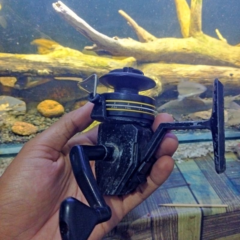Reel pancing poseidon vintage