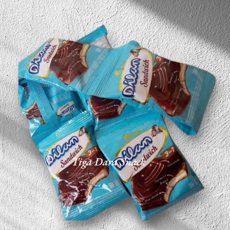 

Garudafood Dilan Sandwich 1 Renceng isi 10 pcs - Biskuit Sandwich Isi Cokelat Lezat