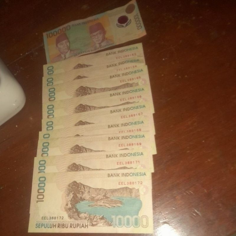 9 lembar uang kertas 10rb cut nyak dhien  plus 1 lembar 100rb polymer