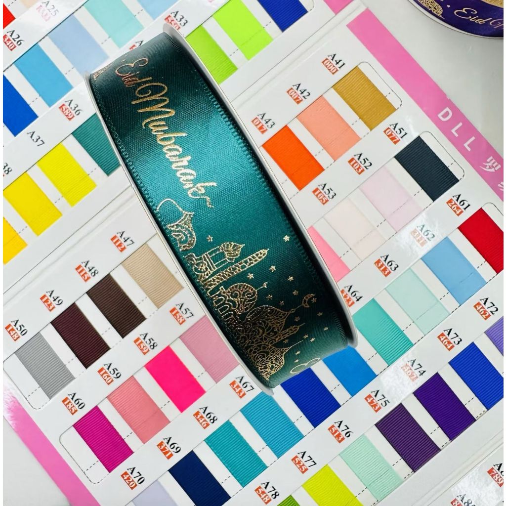 

(1 ROLL ) PITA EID MUBARAK/IDUL FITRI LEBAR 2CM DAN 2.5CM PER ROLL PITA HAMPERS KADO HIASAN RIBBON GIFT PITA DEKORASI