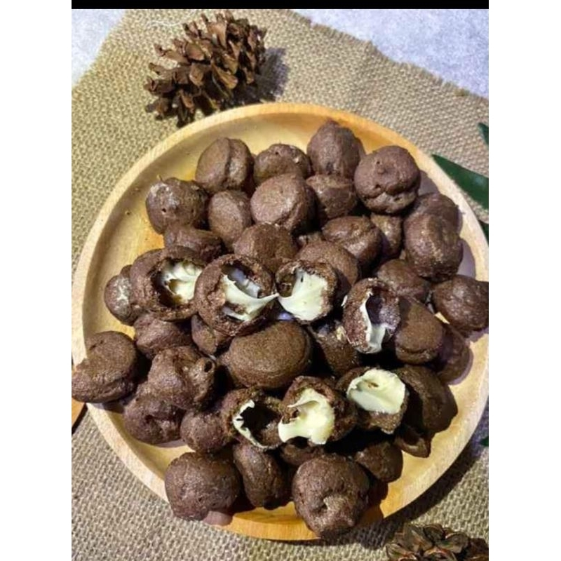 

cemilan soes/sus kering coklat isi vanila berat 250 g