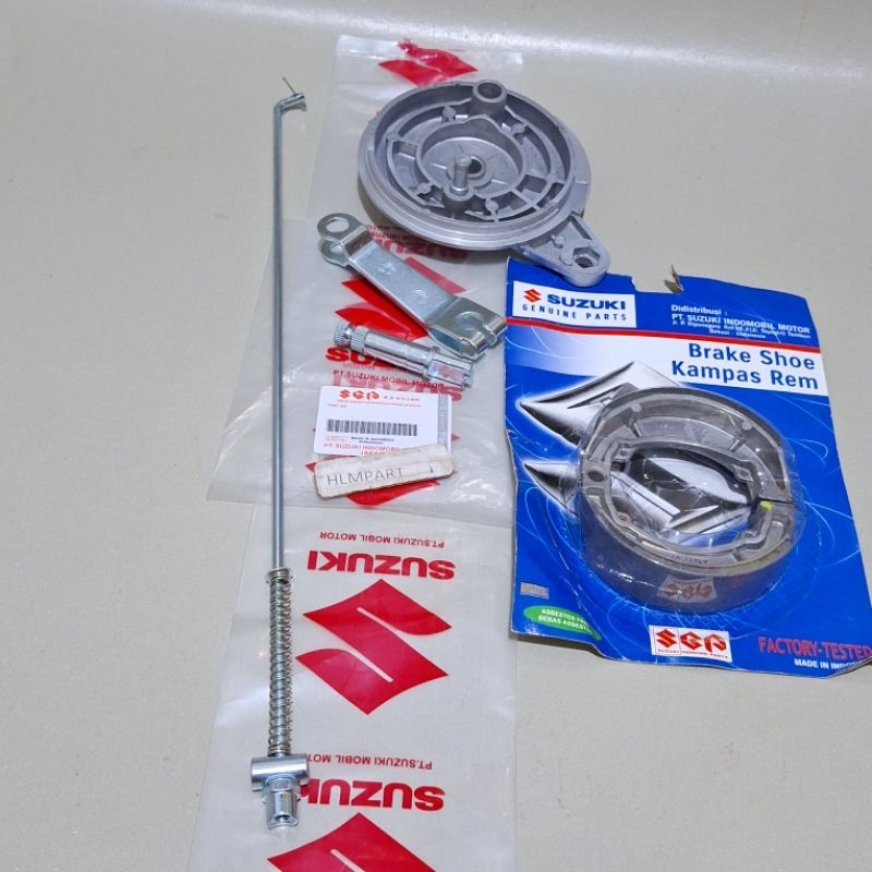 Paket tutup tromol belakang isi paha,as paha,kampas rem tiang rem Suzuki Smash Lama new Shogun 110