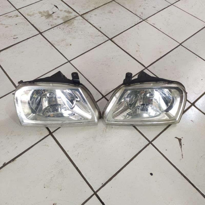 headlamp Mitsubishi L200 sepasang second copotan original