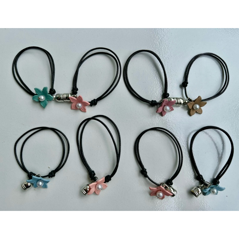 Gelang couple magnet kamboja 12 pcs gelang magnet gelang serut karakter