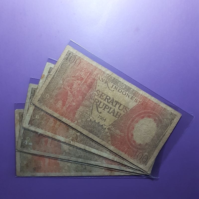Uang kuno 100 rupiah pekerja 1964