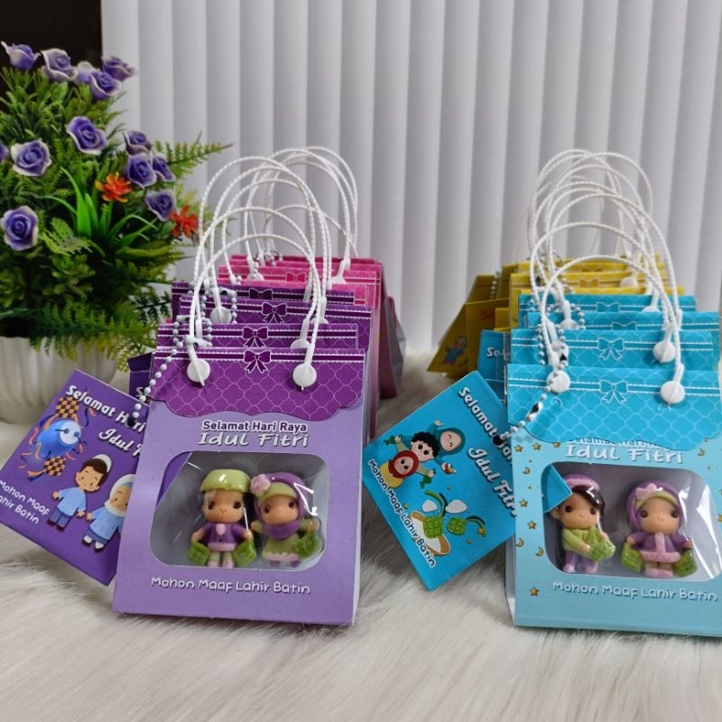 

Cokelat Lebaran Kemasan tenteng jendela isi 2