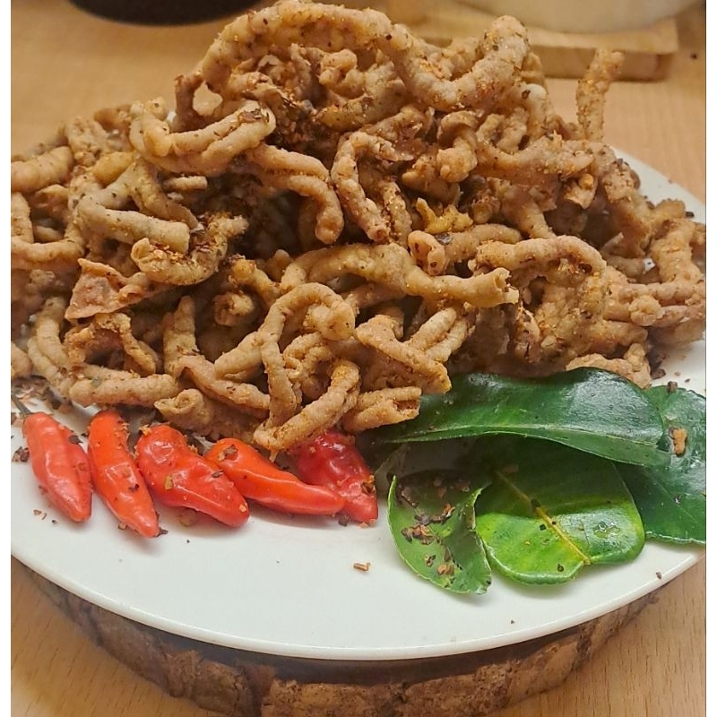 

KERIPIK USUS PEDAS (termurah) 500gram (Pedas Gurih daun Jeruk)