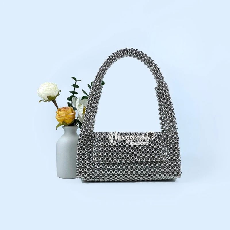 tas pesta manik manik