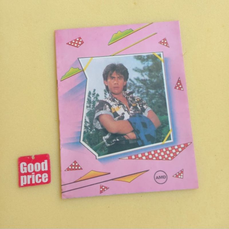 

Buku tulis garis jadul cover Rico Tampatty