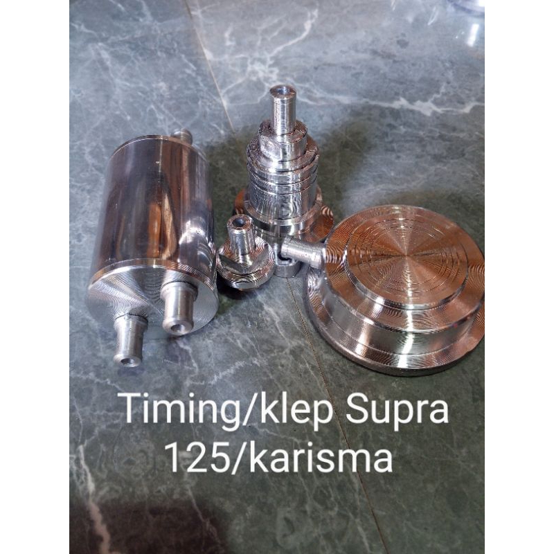 Tutup timing tabung hawa. tutup oli .tutup klep Supra 125/ karisma