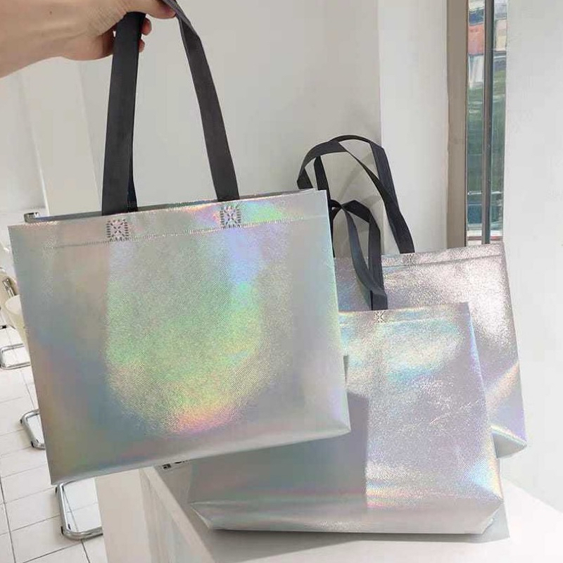 

goodie bag tas spunbond tas jinjing hologram metalik