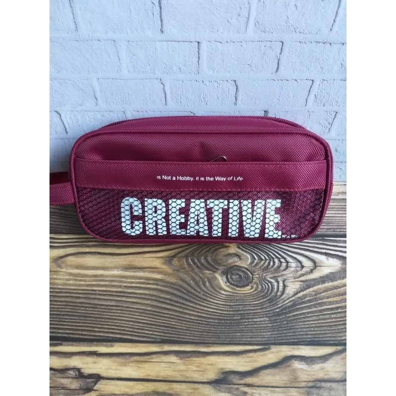 

Kotak pensil remaja kain Action