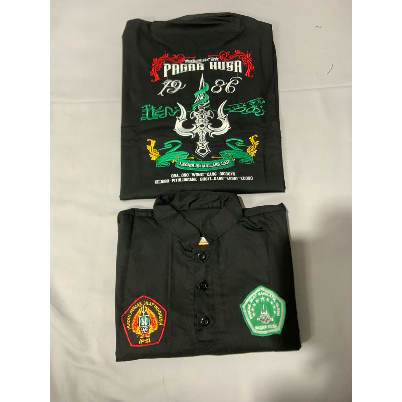 sakral atasan pagar nusa bordir motif trisul baru