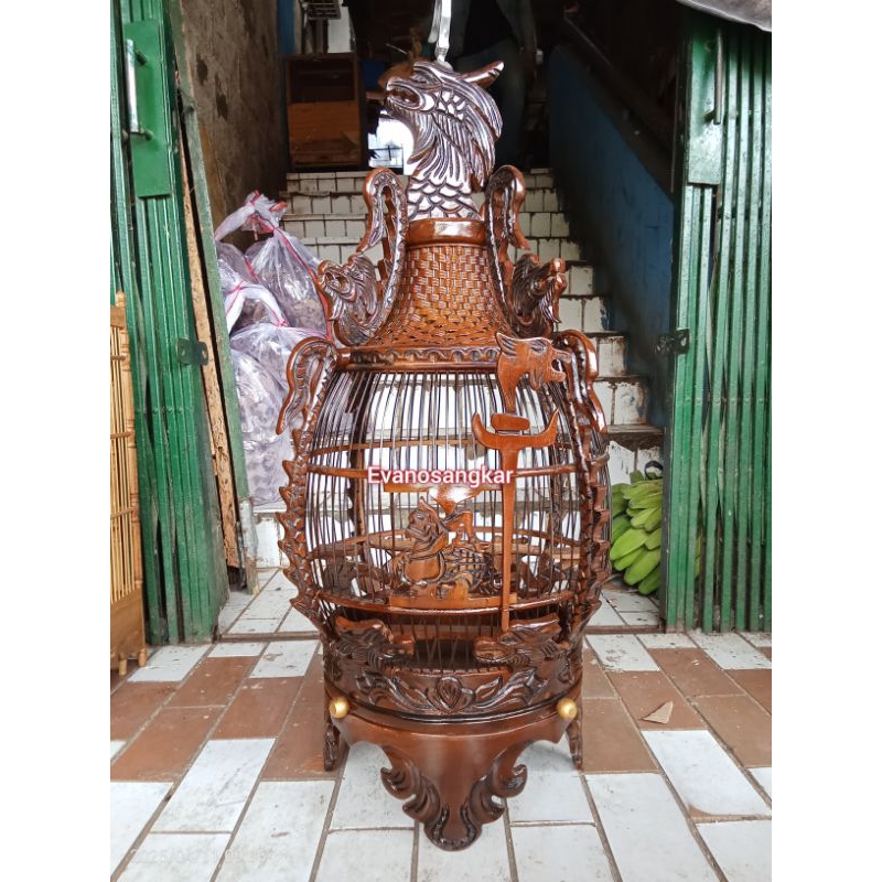 SANGKAR BURUNG PERKUTUT KAYU JATI UKIR NAGA JEPARA TERLARIS