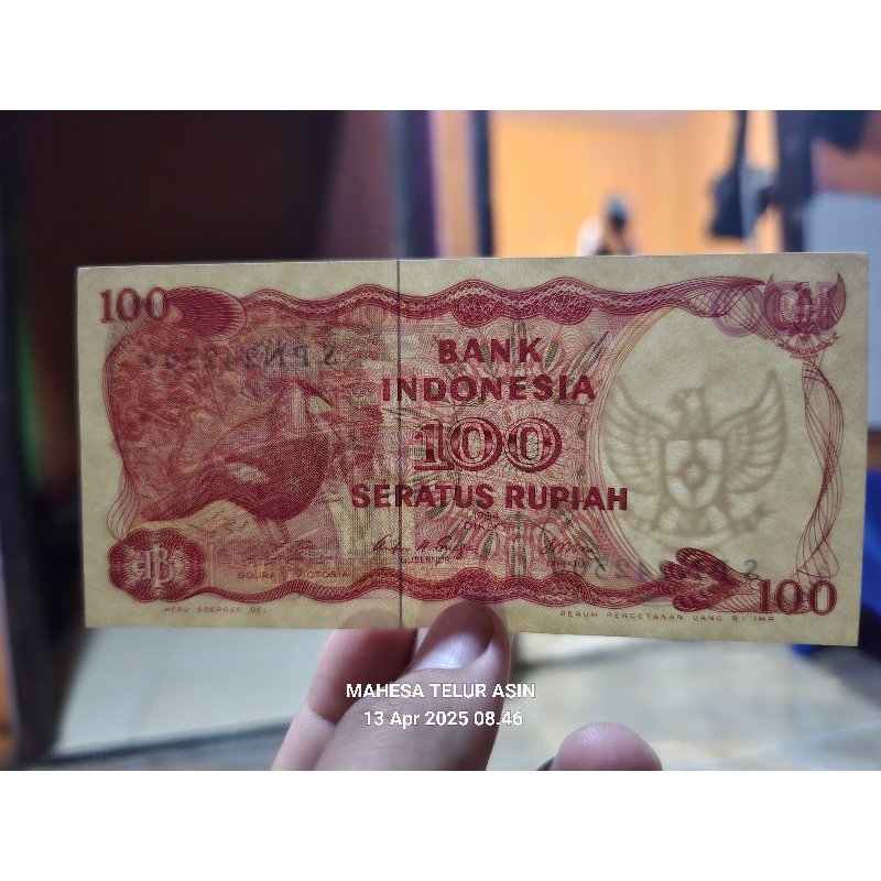 100 rupiah 1984 ASLI(BURUNG GOURA VICTORIA)
