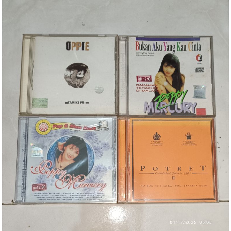 cd Indonesia OPPIE ANDARESTA-Hitam Ke Putih (1) / POPPY MERCURY-Bukan Aku Yang Kau Cinta / POPPY MER
