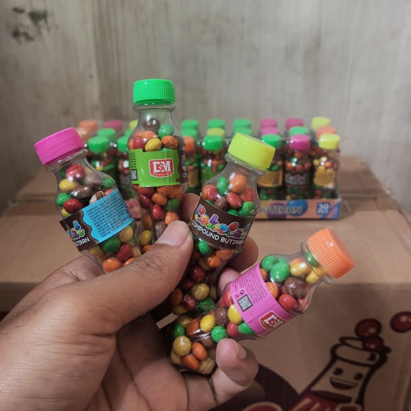 

DSM permen coklat compond botol cola isi 30pcs 1box