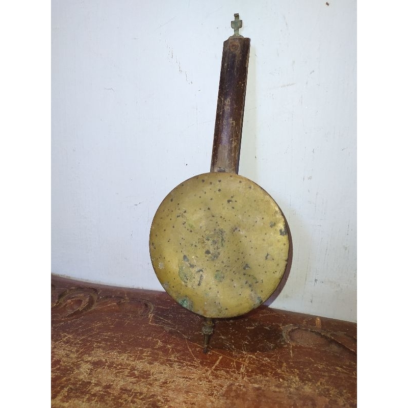 Bandul jam dinding kuningan jadul lawasan