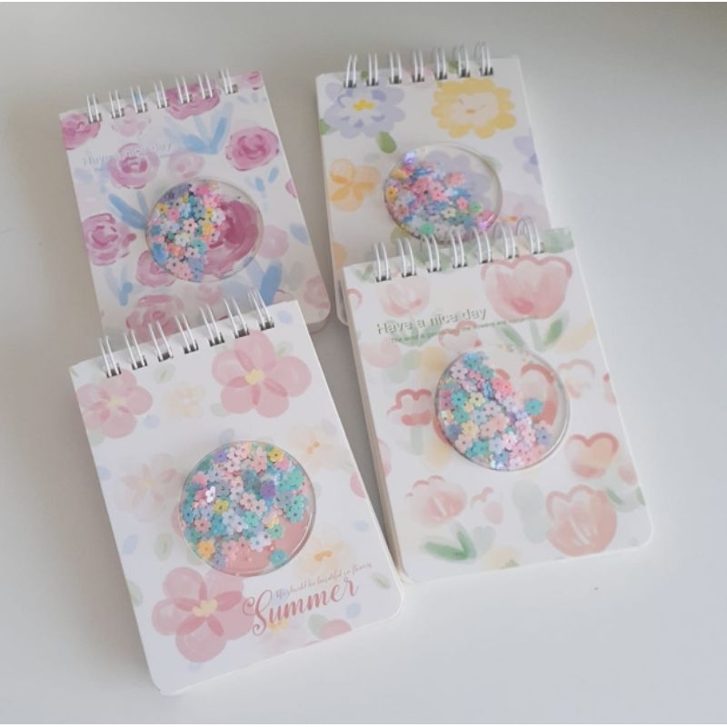 

Notebook Sampul Depan Glitter motif Bunga