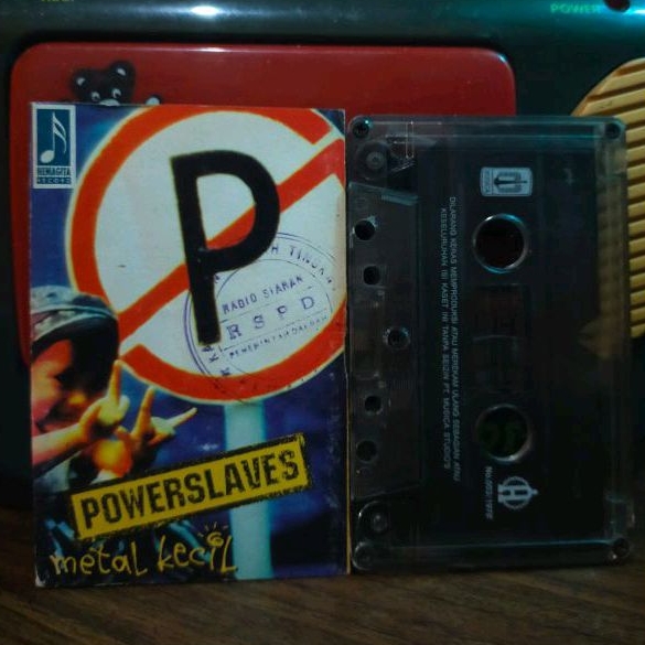 Kaset pita power Slaves metal kecil