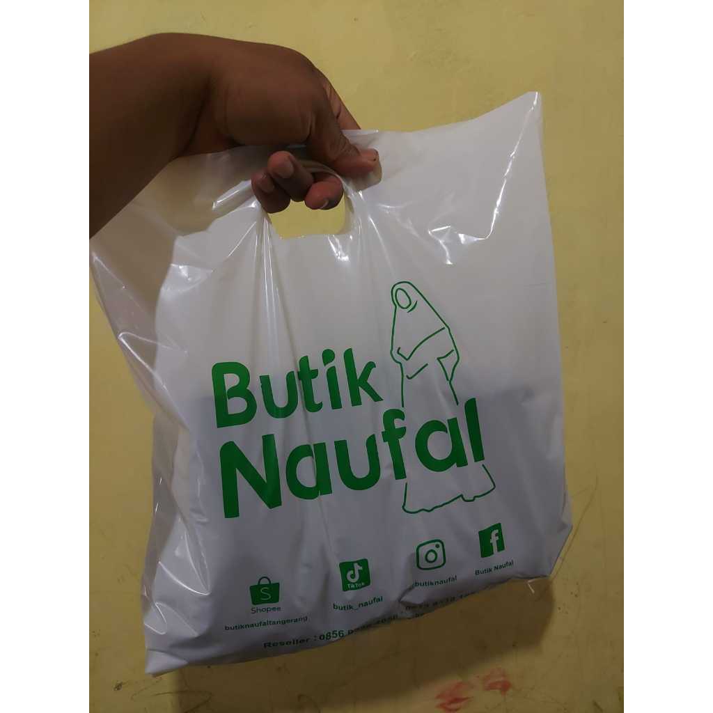 

Tas Plastik PE Glosy 30x38 Oval Plastik Belanja Sablon Putih susu
