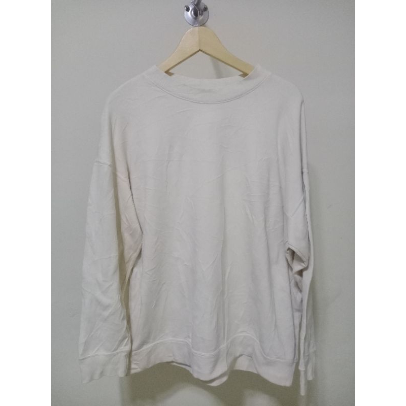 UNIQLO CN CREAM POLOS SWEATER