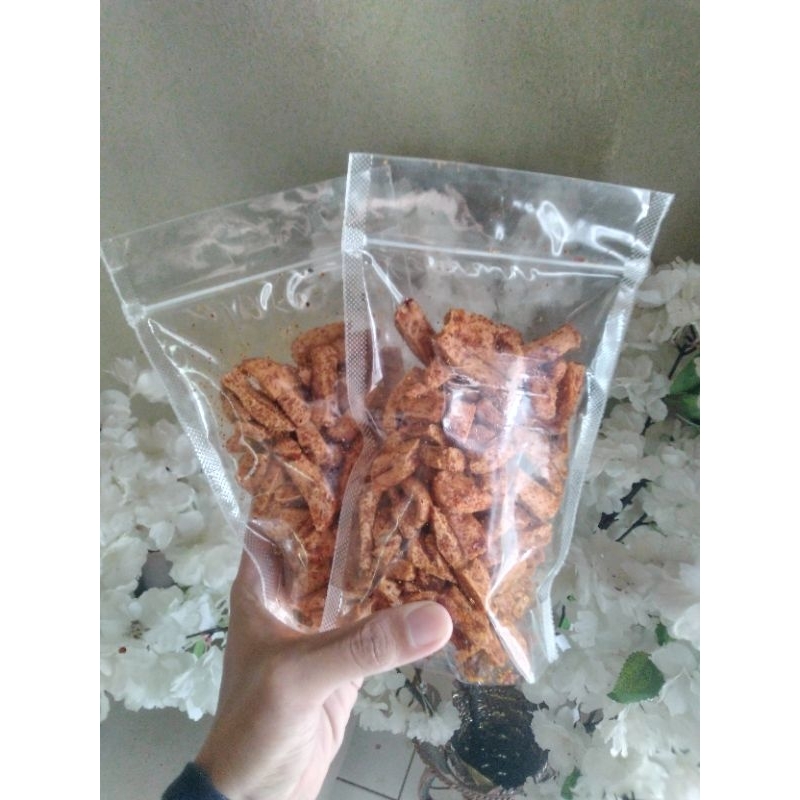 

Basreng Pedas Daun Jeruk Kemasan 100 Gram Camilan Renyah Gurih Pedas