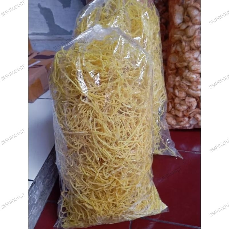 

Kerupuk mie awud mie kuning kenyol remukan mie 500 gram gurih khas tegal