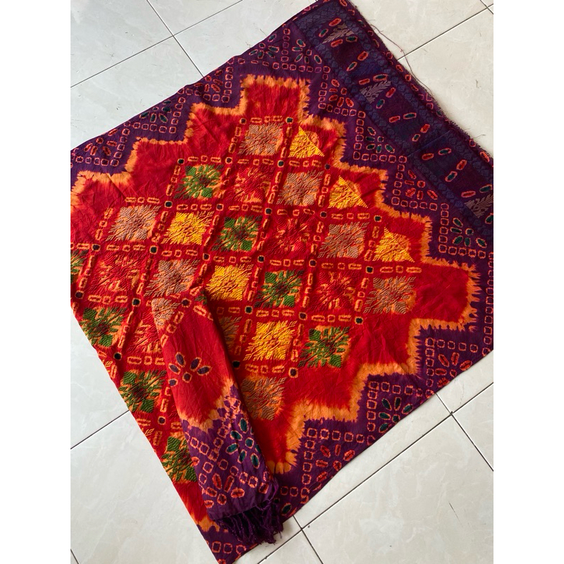 Sutra Jumputan Cakra Tumpal songket