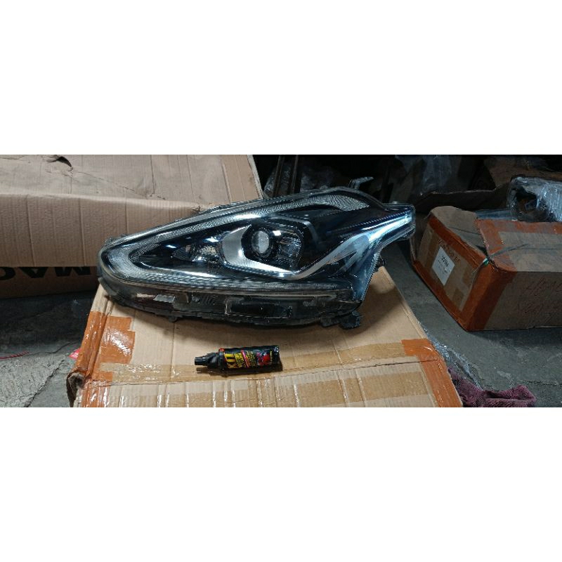Headlamp ORI copotan TOYOTA SIENTA Q bekas mulus