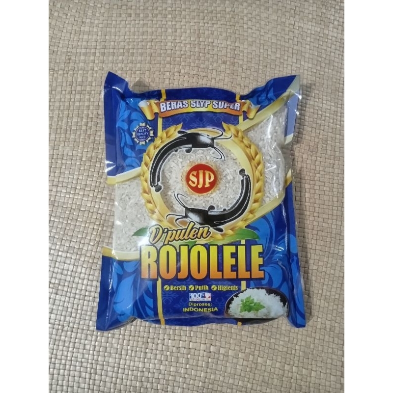

Beras pulen lokal 1kg dengan packaging Rojolele