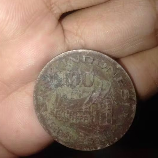 Koin Rp100 hutan untuk kesejahteraan. Koin kuno