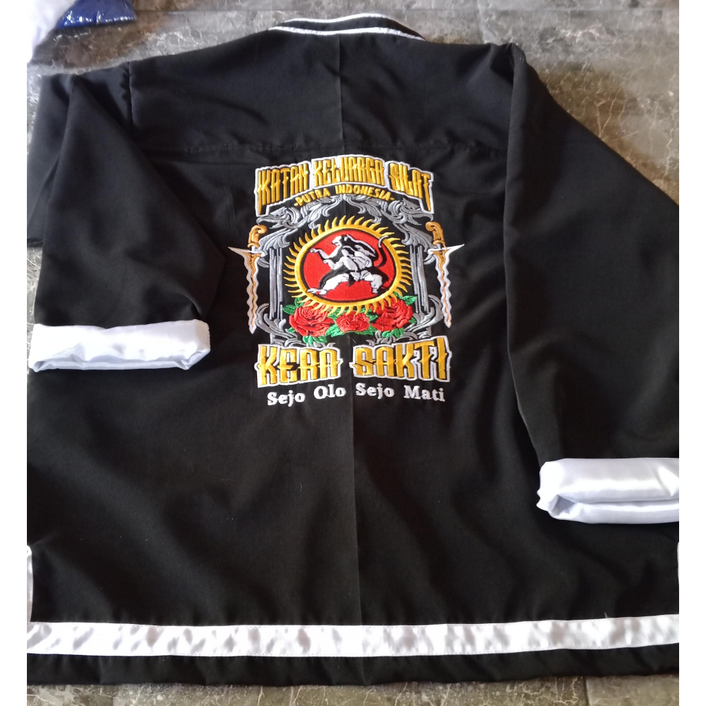 ATASAN SAKRAL BORDIR IKSPI KERA SAKTI/ATASAN BORDIR IKSPI KERA SAKTI