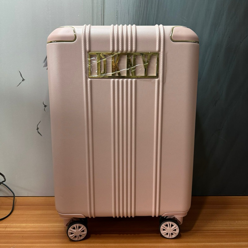 Koper DKNY Uptown cabin size 20inc pink