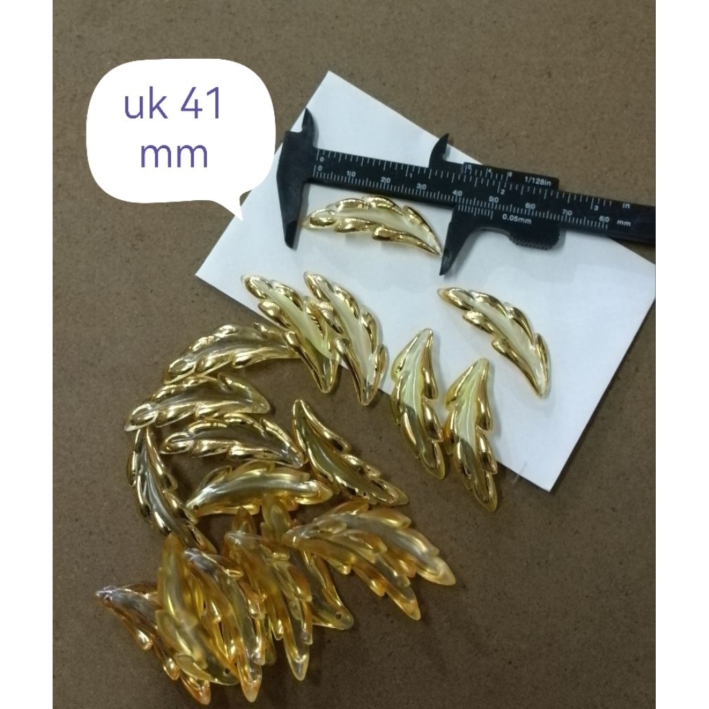 mote manik daun bening list gold sembur gradasi