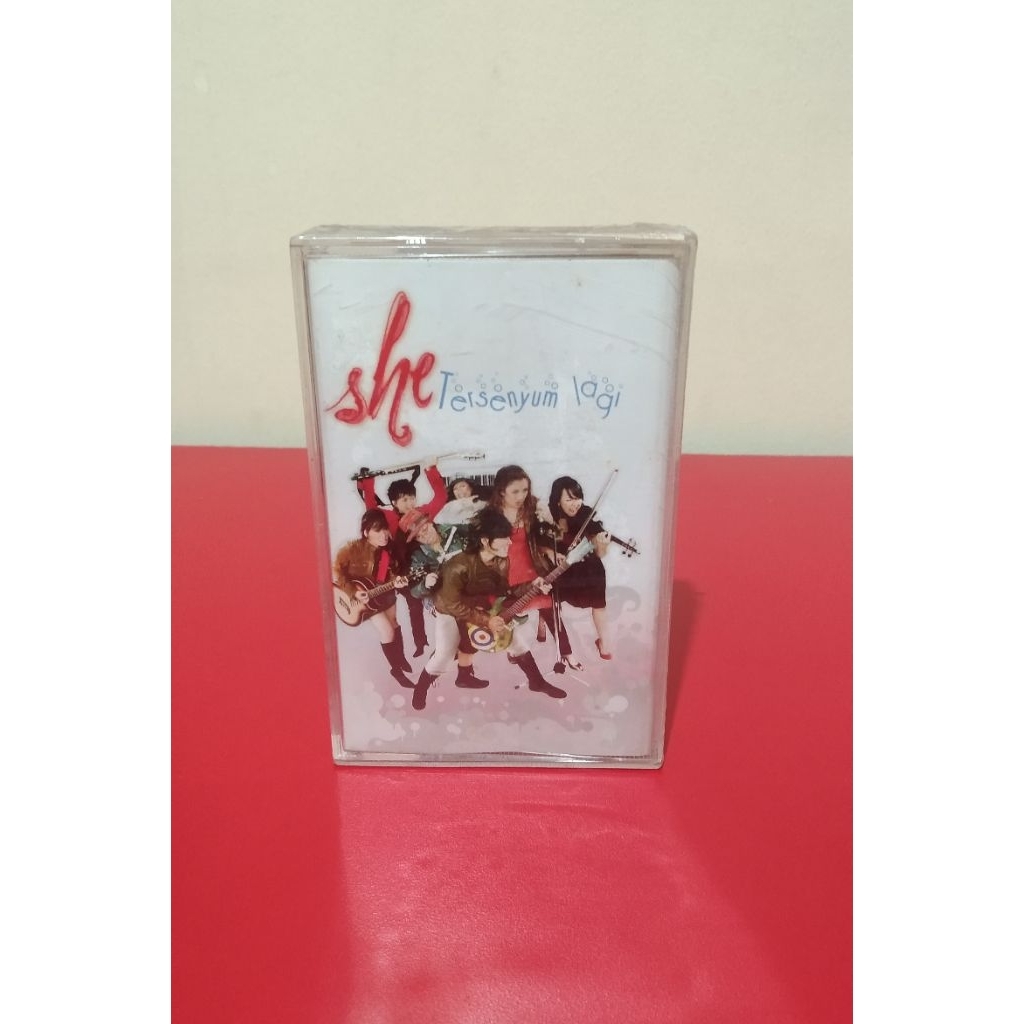 Kaset Pita Original SHE - Tersenyum Lagi