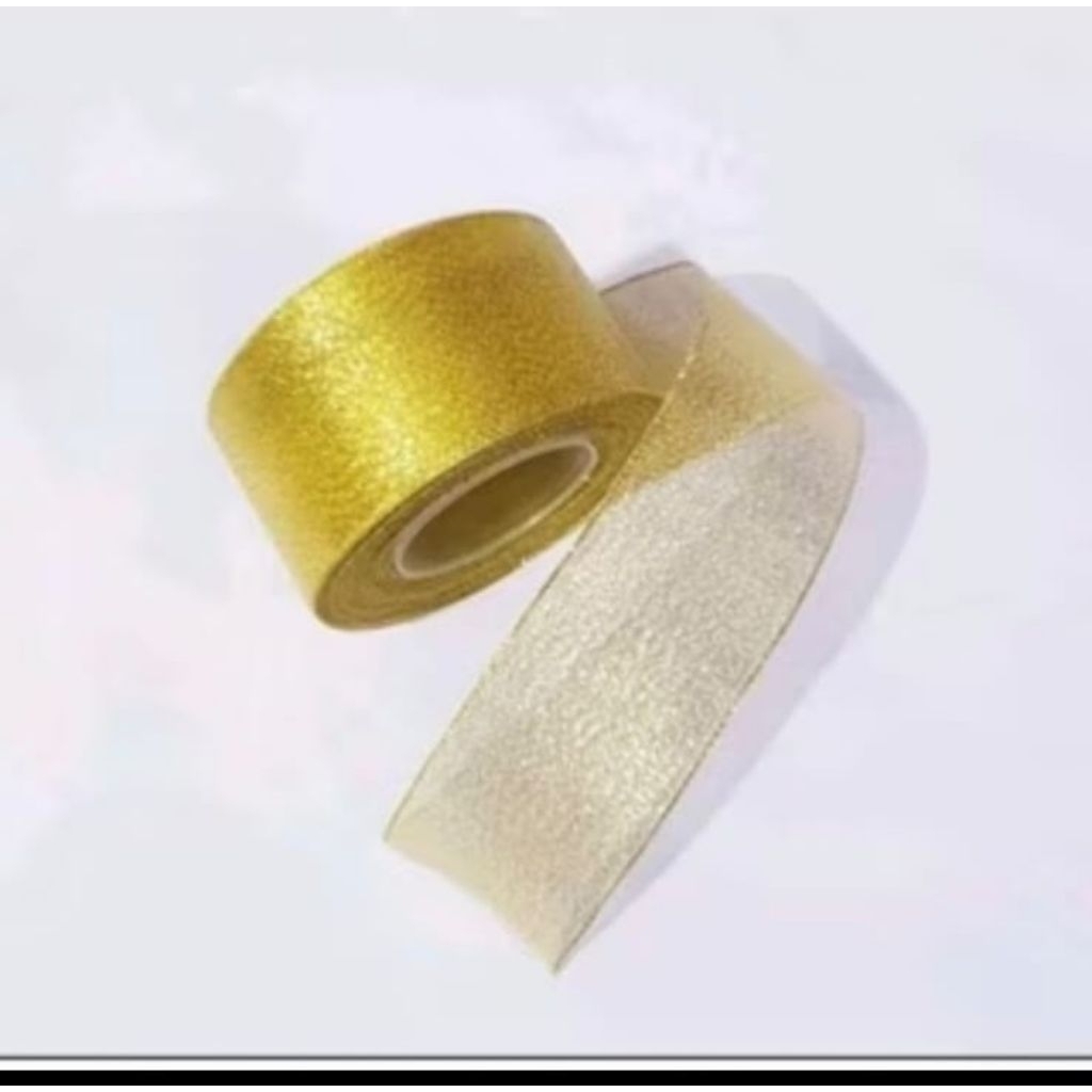 

PITA GLITER MAS & PERAK METALIK LEBAR 4CM ( 1,5") HARGA PER ROLL ISI 20 YARD