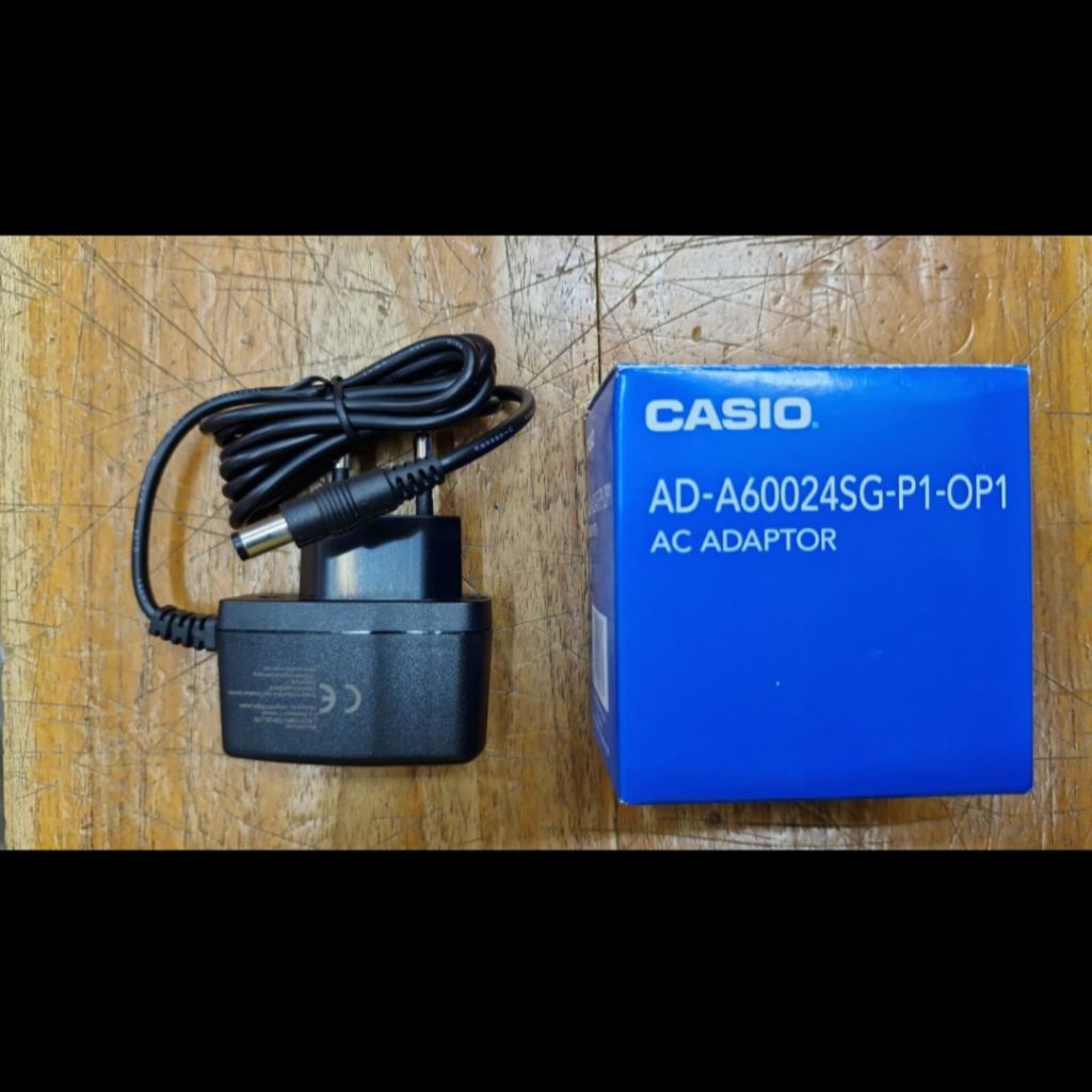 

CASIO ADAPTOR KALKULATOR AD A60024SG P1 OP1