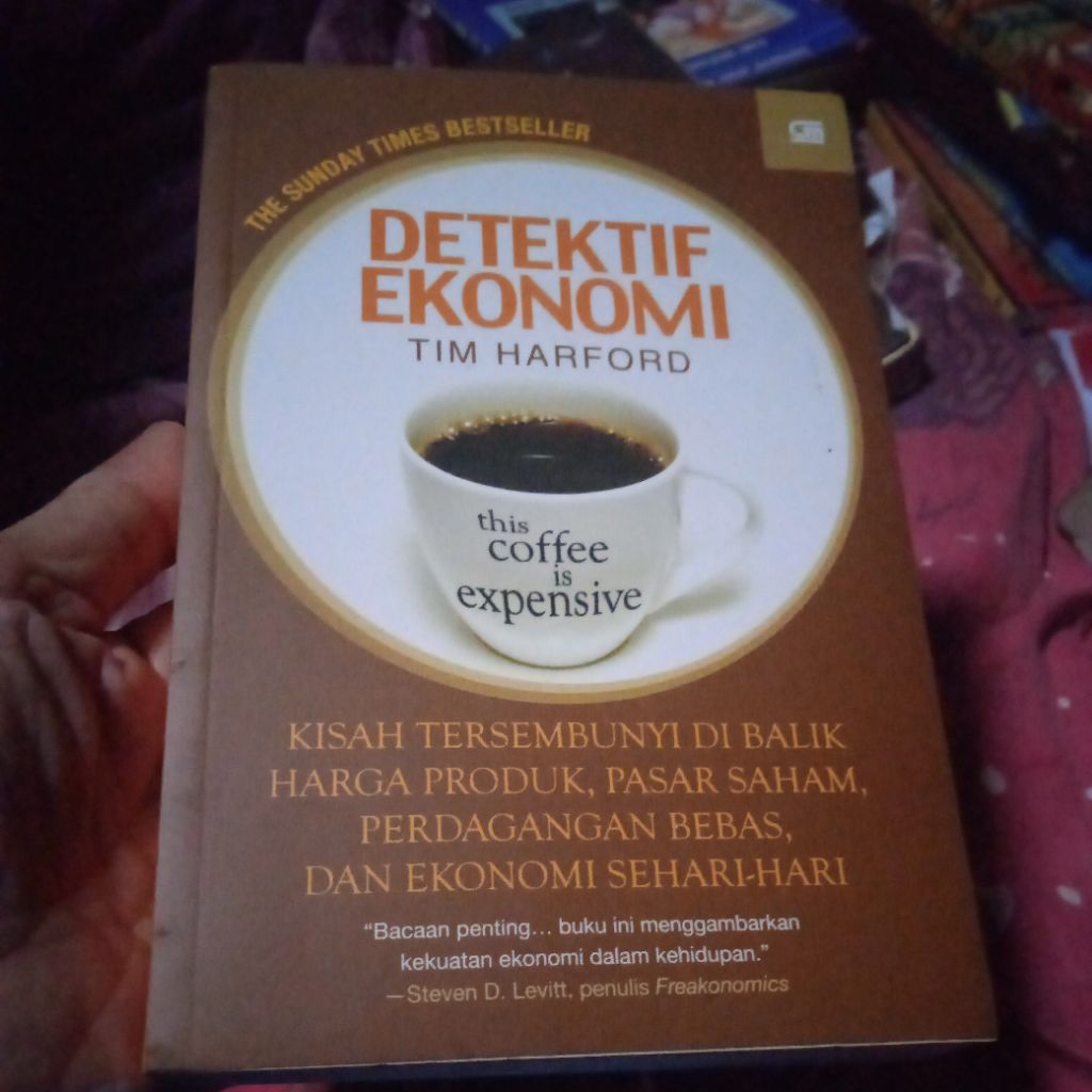 buku Detektif Ekonomi, kisah tersembunyi di balik harga produk, Pasar saham, perdagangan bebas, buku