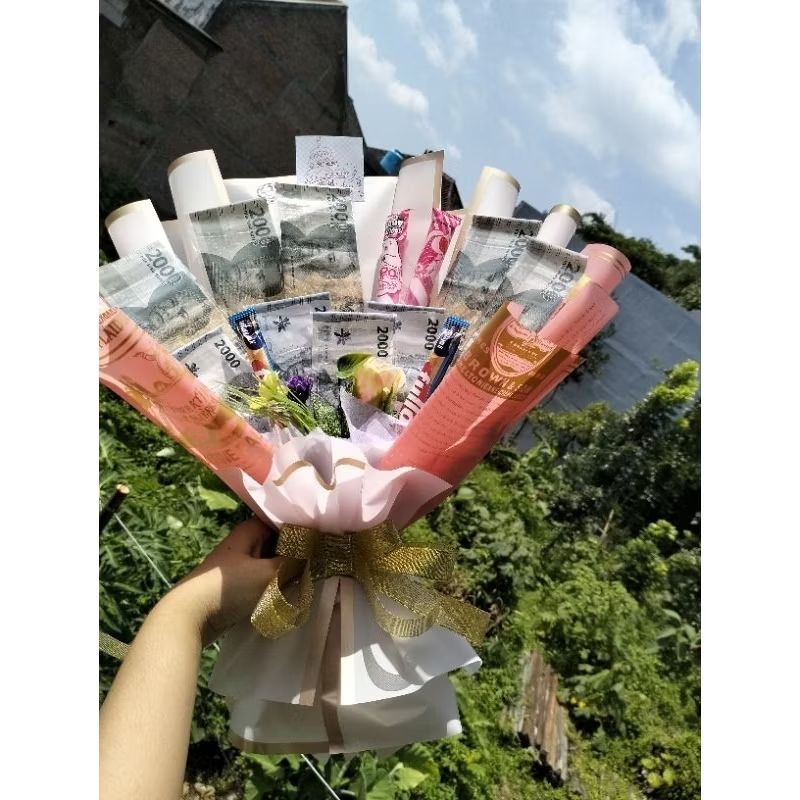 

BUKET 10LEMBAR UANG+SNACK